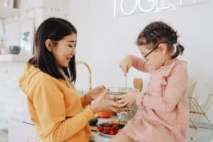 mom in kitchen with daughter